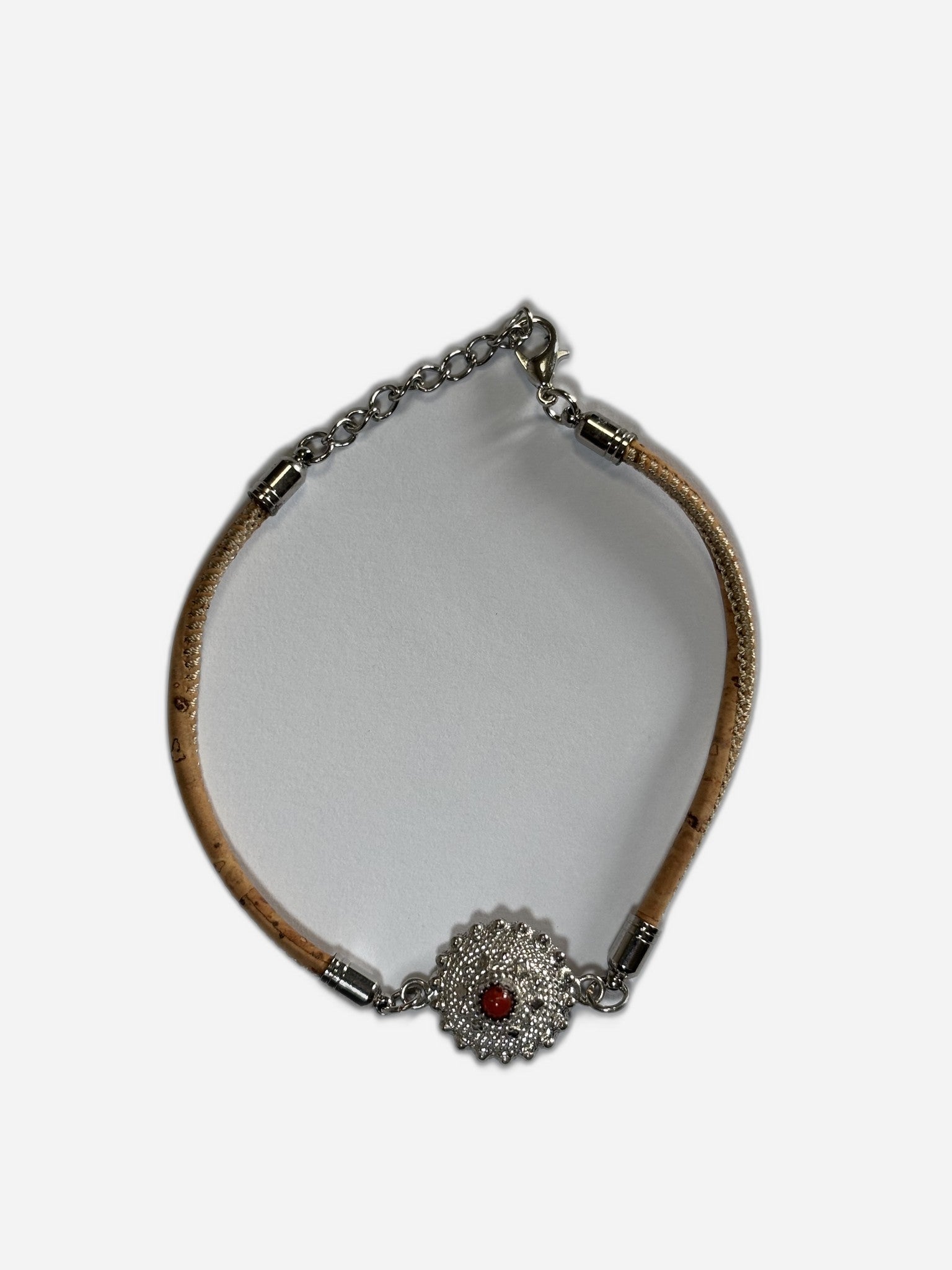 Bracelet with a decorative clasp on a white background